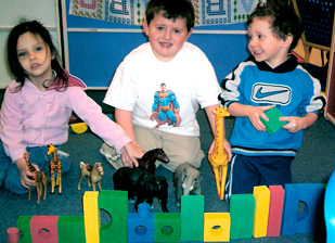 Children with toy animals