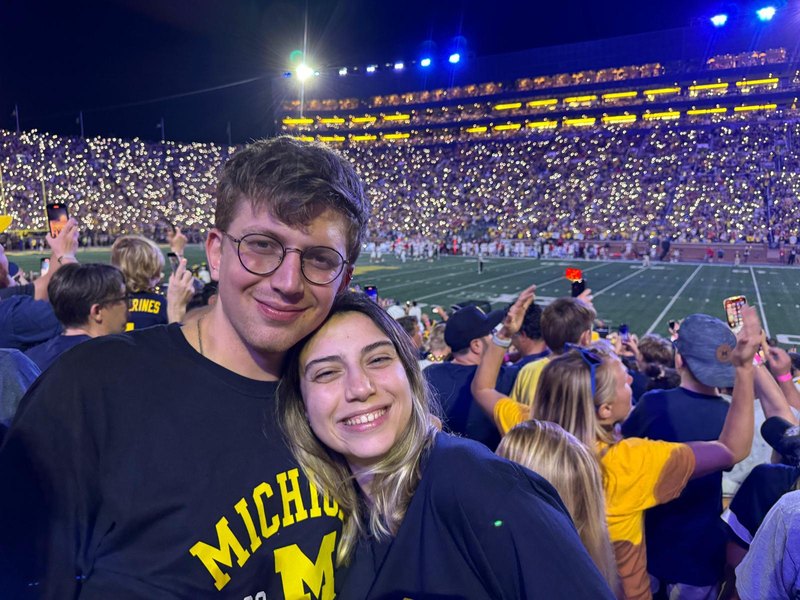 Me and my girlfriend Doğa at a Michigan football game