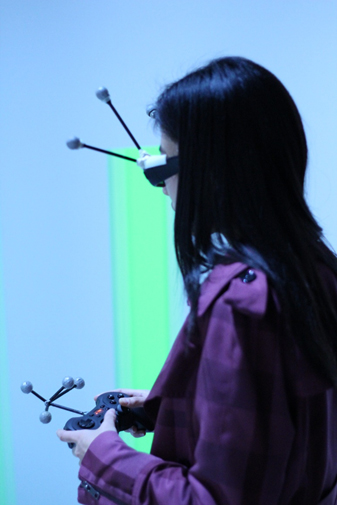 Figure 1: User in immersive, CAVE-like, VR environment used in this study. Figure 1: User in immersive, CAVE-like, VR environment used in this study.