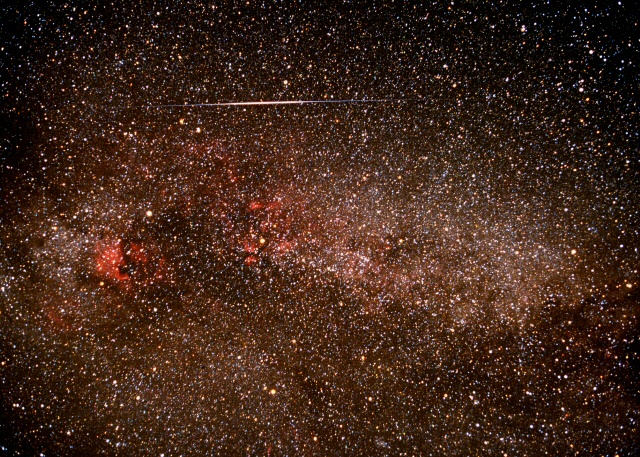 Cygus with Lyrid Meteor