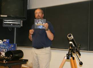 John holds up the Messier book