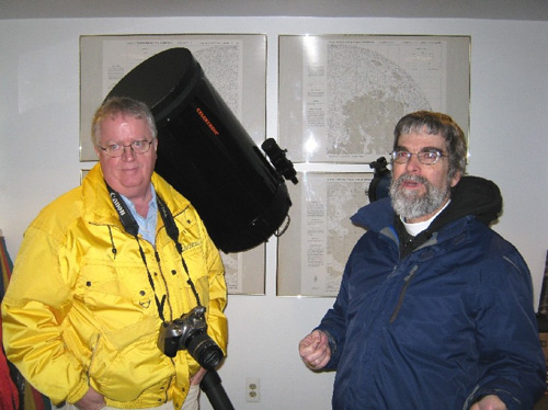Norbert Vance giving Brother Guy a tour of the observatory at Sherzer Hall.