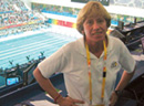 Janet Kolodzy celebrates Olympic spirit in front of the Bird's nest. Robinson at pool