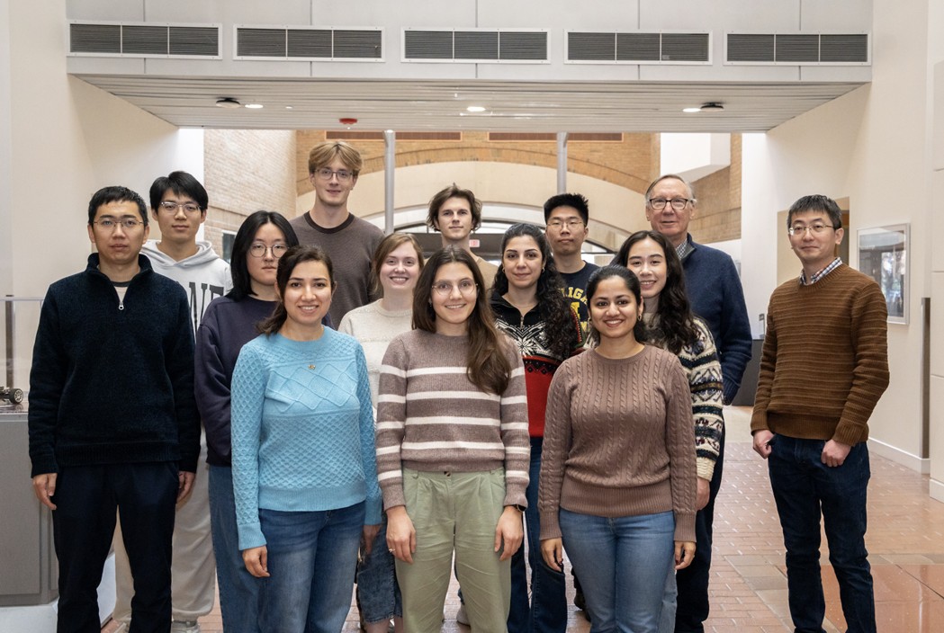The OCM group in winter inside the atrium of  the EECS building.